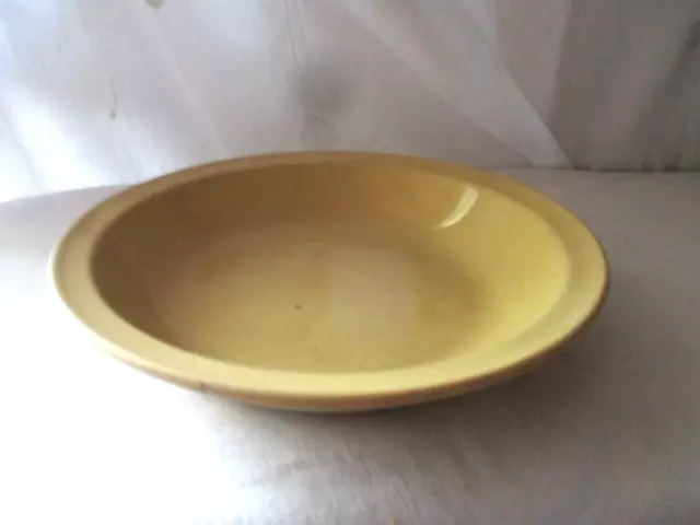Ancien plat creux rond ou assiette  en terre cuite vernissée jaune  19ème -24 cm
