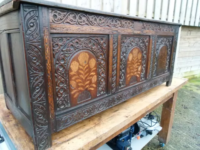 C1680-1720 Fabulous Triple Panelled With Marquetry Decoration Carved Oak Coffer.