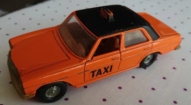 Vintage Corgi Mercedes Benz 240D Taxi. Rare version in orange.
