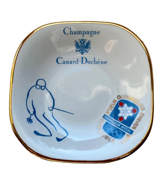 Petit plateau. Jeux Olympiques hiver de 1968 Grenoble. Faïence. Skieur bleu sur fond blanc. STE SAFROSE. - Label Emmaüs