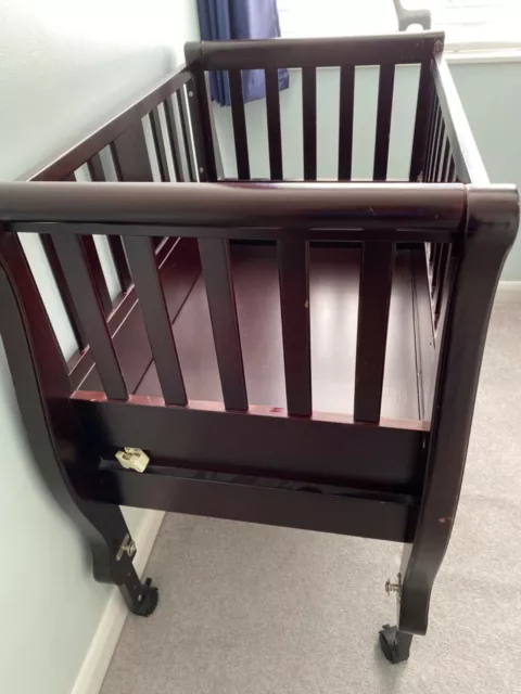 Arm's reach sleigh bed co sleeper top