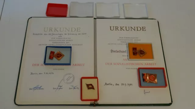 Medaille Urkunde Aktivist der sozialistischen Arbeit  DDR. Konvolut.