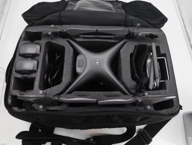 DJI phantom 4 pro Obsidian with remote, 3 batteries and case. See description