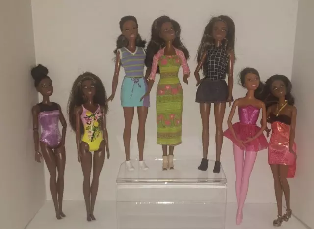 Lot of 7 cute African American Barbie Dolls