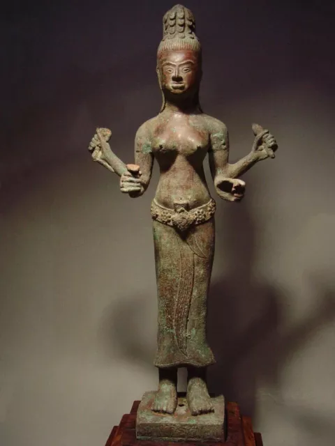 KHMER BRONZE STATUE OF A MULTI-ARM FEMALE DEITY. CAMBODIA 17/18th C.