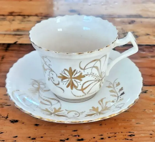 Royal Albert Cup And Saucer White with  Gold Trim