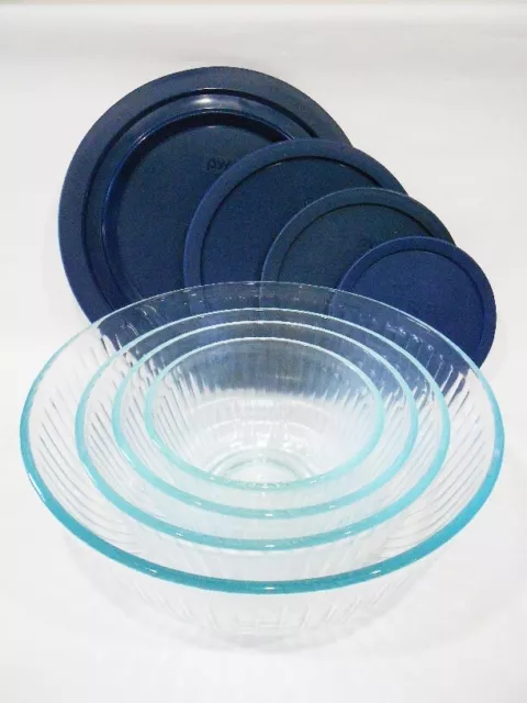 https://www.picclickimg.com/ZkMAAOSw15ZkAIhu/8-pc-PYREX-Clear-SCULPTURED-Glass-Mixing-Bowl.webp