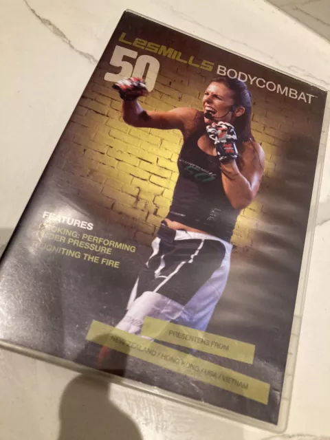 Les Mills BODYCOMBAT BODY COMBAT 50 DVD CD and notes  -