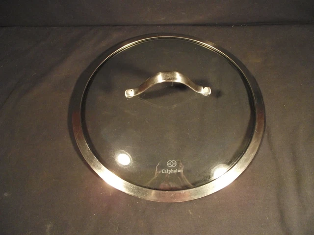 12" Calphalon Lid Replacement Tempered Glass. ID 11 7/8 OD 12 3/8. Excellent !
