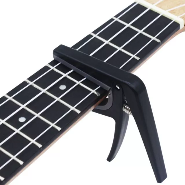 Praktischer Ukulele Capo 4 String Hawaii Gitarrenstimmzange Schnellwechsel