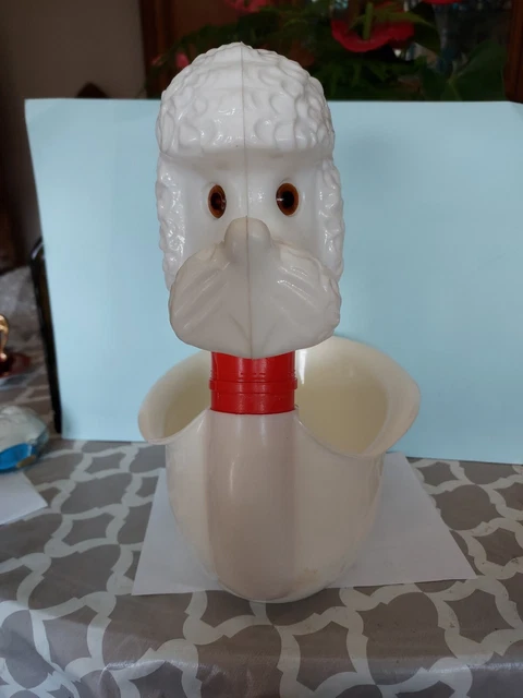 Ecusson thermocollant jouet vintage chien à roulettes 5x4cm