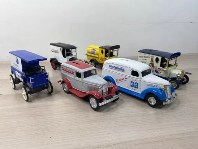 1:25 DieCast Trucks Bank Lot of 6. Ertl, Golden Wheels. 1904 - 1936 Vehicles.