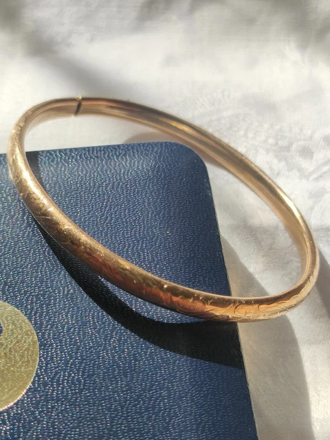 Joli bracelet métal doré avec chainette de sécurité