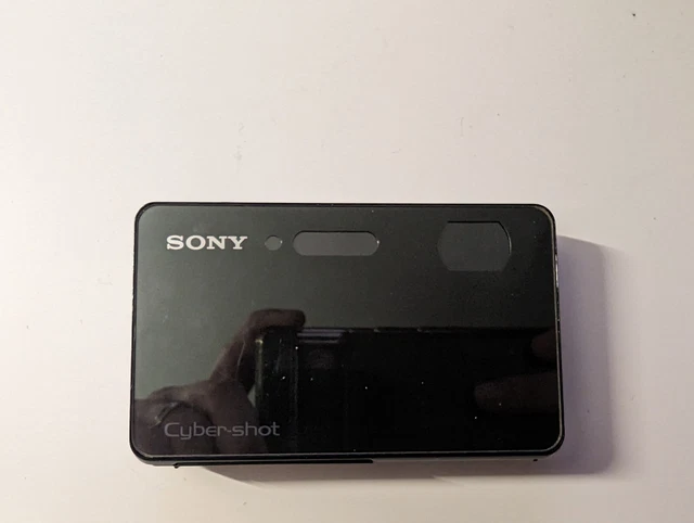 appareil photo sony cybershot dsc-tx200v défectueux avec housse cuir et batterie