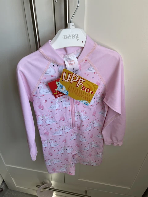 Ollie's Place nuoto/tuta da sole rosa cigno UPF 50+ età 3/24 - 36 mesi - nuovo con etichette