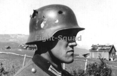 WW2 Picture Photo German Soldier with several holes in the helmet  3980