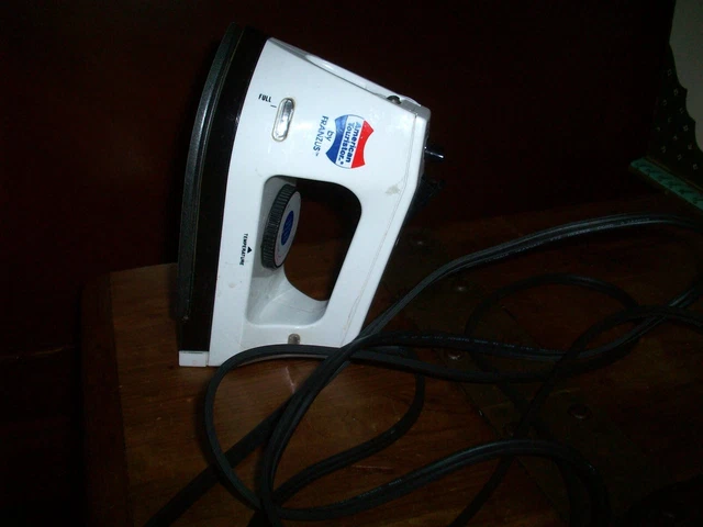Travel Electric Steam Spray Travel Iron Dual Voltage AMERICAN TOURISTER T-65CI