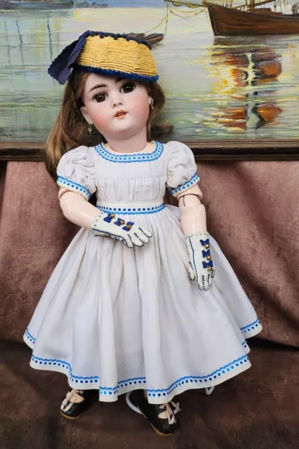 White and blue summer dress and leather gloves for a French or German antique do