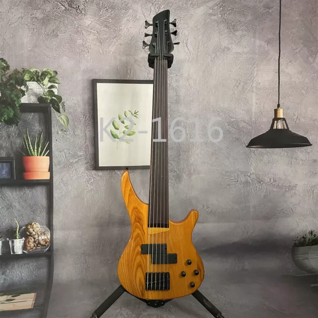 Custom Yellow 6 String Electric Bass Guitar Ash Body No Frets Black parts