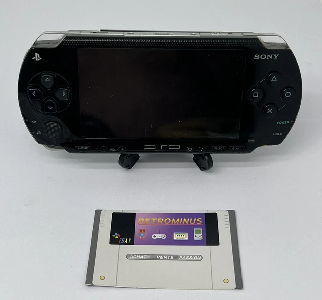 console sony psp 1004 noire avec chargeur non officiel fonctionne parfaitement