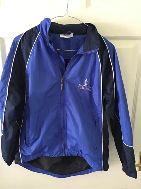 Cappotto antipioggia leggero Taunton scuola con cappuccio nascosto taglia M 12/14 anni blu