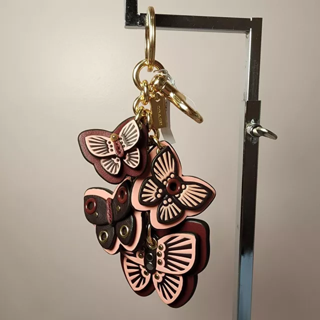 Coach Butterfly Cluster Bag Charm Smooth leather gold/Boysenberry multi 1674