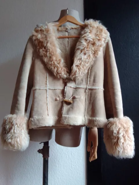 Manteau fausse fourrure etam 2025