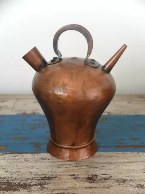 Unusual early to mid 20th century small copper rounded pouring can