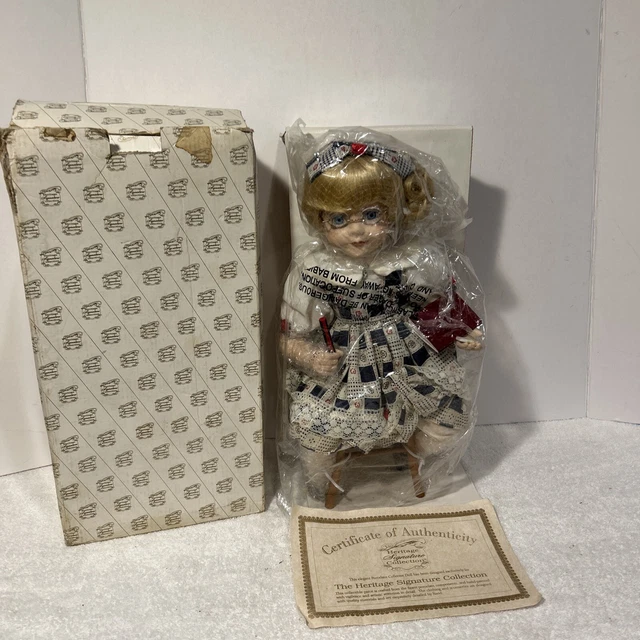 The heritage signature collection porcelain doll and chair school girl