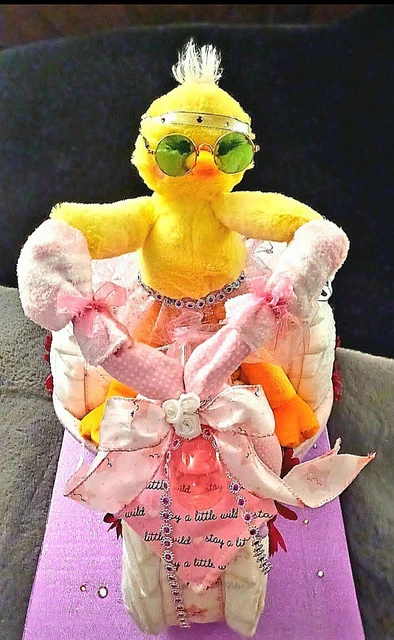 Three wheeling biker chick diaper cake.