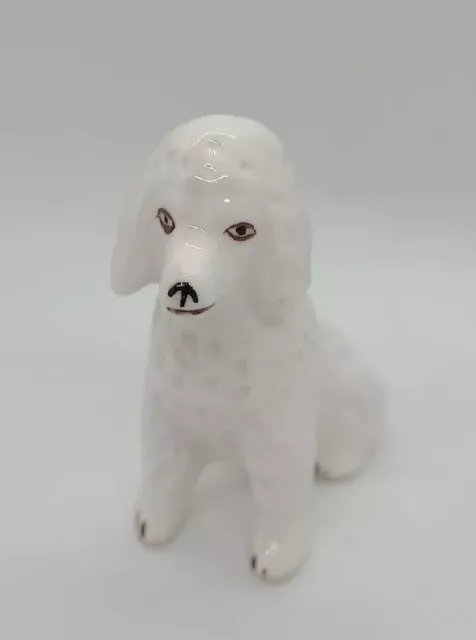 Vintage Porcelain Sitting White Poodle Dog Figurine 2¼” Tall