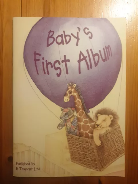 Babys First Photo Album
