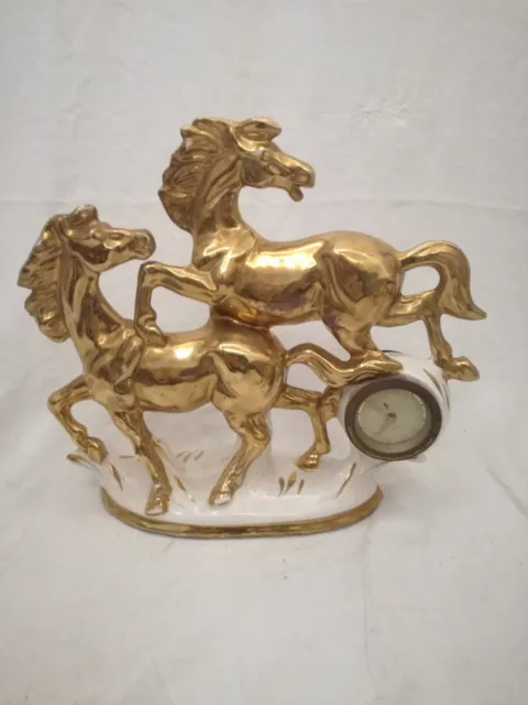 Statua Sesto fiorentino ceramica cavalli dorati con orologio