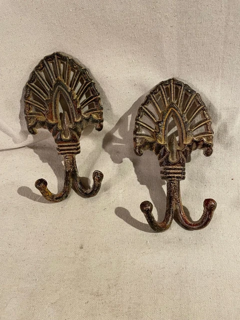 vintage heavy duty cast iron wall hooks Tribal Headdress style PAIR, patina