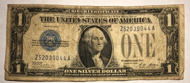 1928A $1 Funnyback blue seal silver certificate FR1601. VG-Fine. #no5