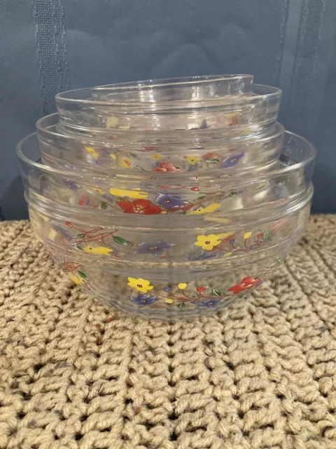 Set of 9- “Durable” Clear Glass Nesting Bowls w/ Flowers Decoration.