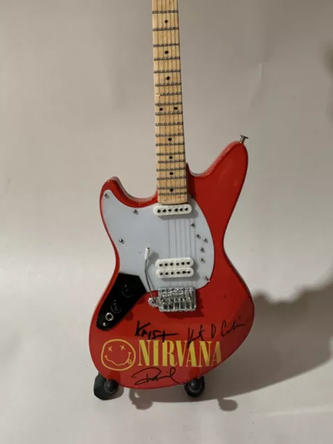 Nirvana Miniature 10” Guitar With Stand.  Rare Item!