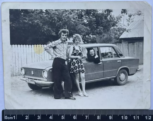 beautiful young guys /girls near the car, an interesting couple, USSR Old Photo