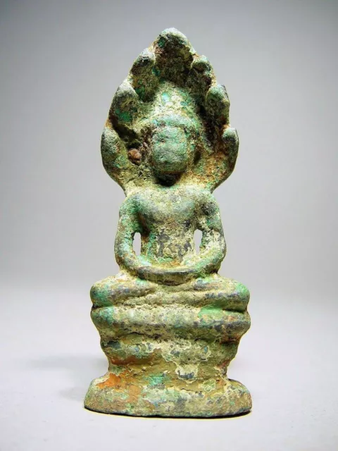 KHMER BRONZE NAGA SHELTERED BUDDHA ANGKOR WAT 'BAYON' STYLE CAMBODIA.  14/15th C