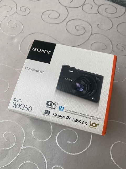 Sony Cyber-Shot DSC-WX350 18.2MP Digital Camera Plus 32GB SD Card