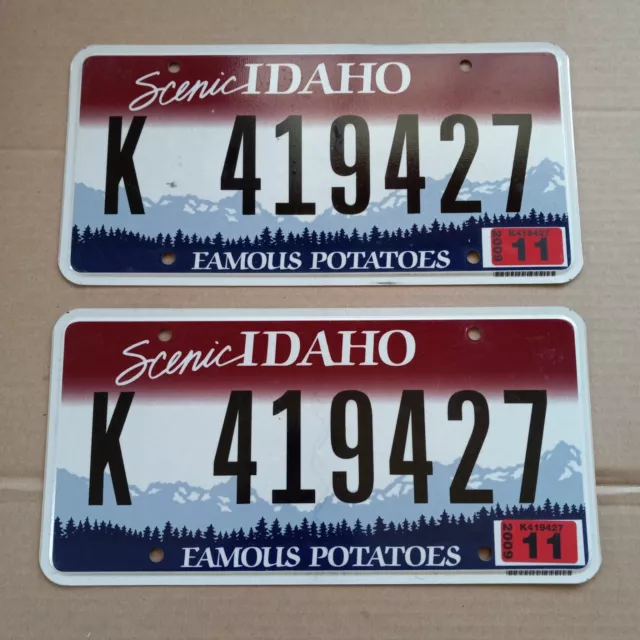 PAIR 2011 Idaho License Plates - "K 419427" 2009 11 sticker FAMOUS POTATOES