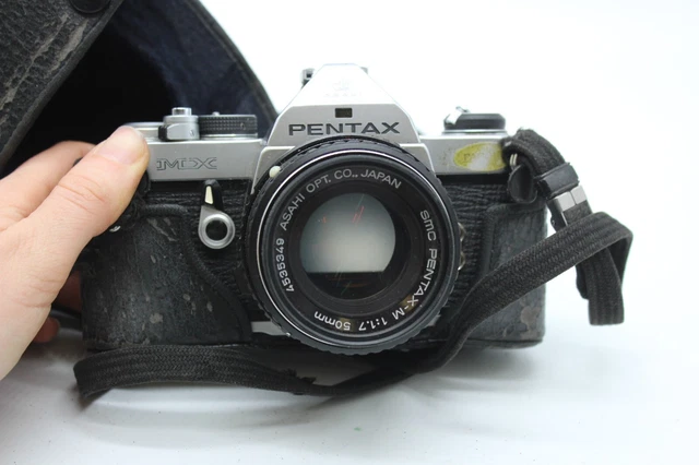 Cámara réflex F vintage Asahi Pentax MX con lente SMC Pentax-M 1,7 50 mm en estuche.