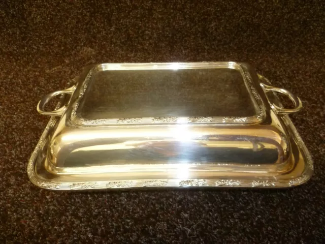 AN ANTIQUE RECTANGULAR TWO SECTION SILVER PLATED SERVING TUREEN. 'BARKER Bros' 2