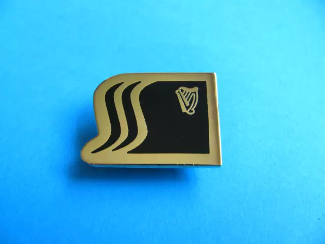 Guinness Pin badge. VGC. Unused. Black Enamel with Gold Harp