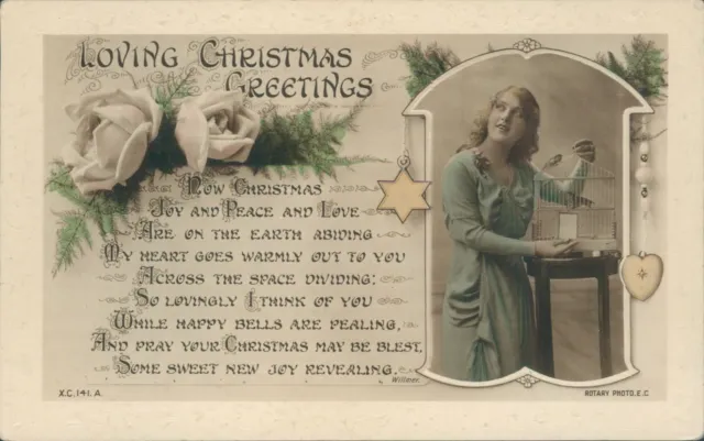 Real photo Christmas message flowers & woman with birdcage rotary