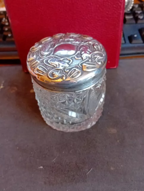 A stunning Art nouveau solid silver topped glass jar Birmingham 1901
