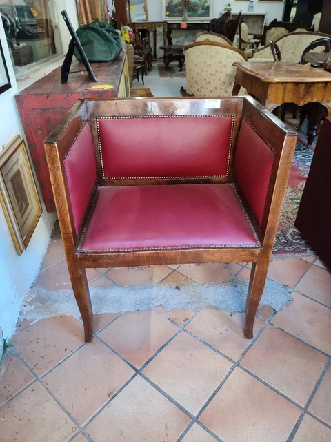 Poltrona pozzetto vintage anni '60 in pelle struttura in legno