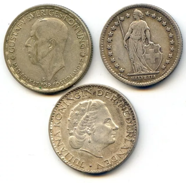 Nine quarter-sized silver world coins from different countries