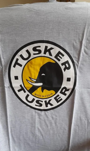 Tusker Beer t-shirt 💙  size XL. New  Kenya HARIASTAMP Baada ya kazi...
