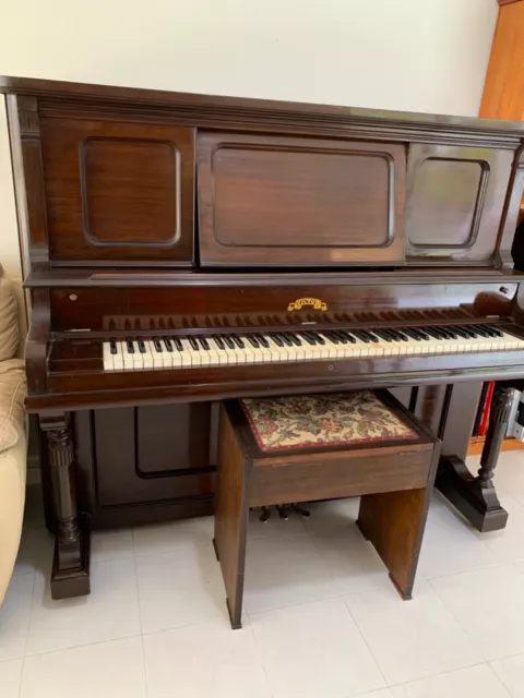 Piano. Victor, upright good condition. Stool included